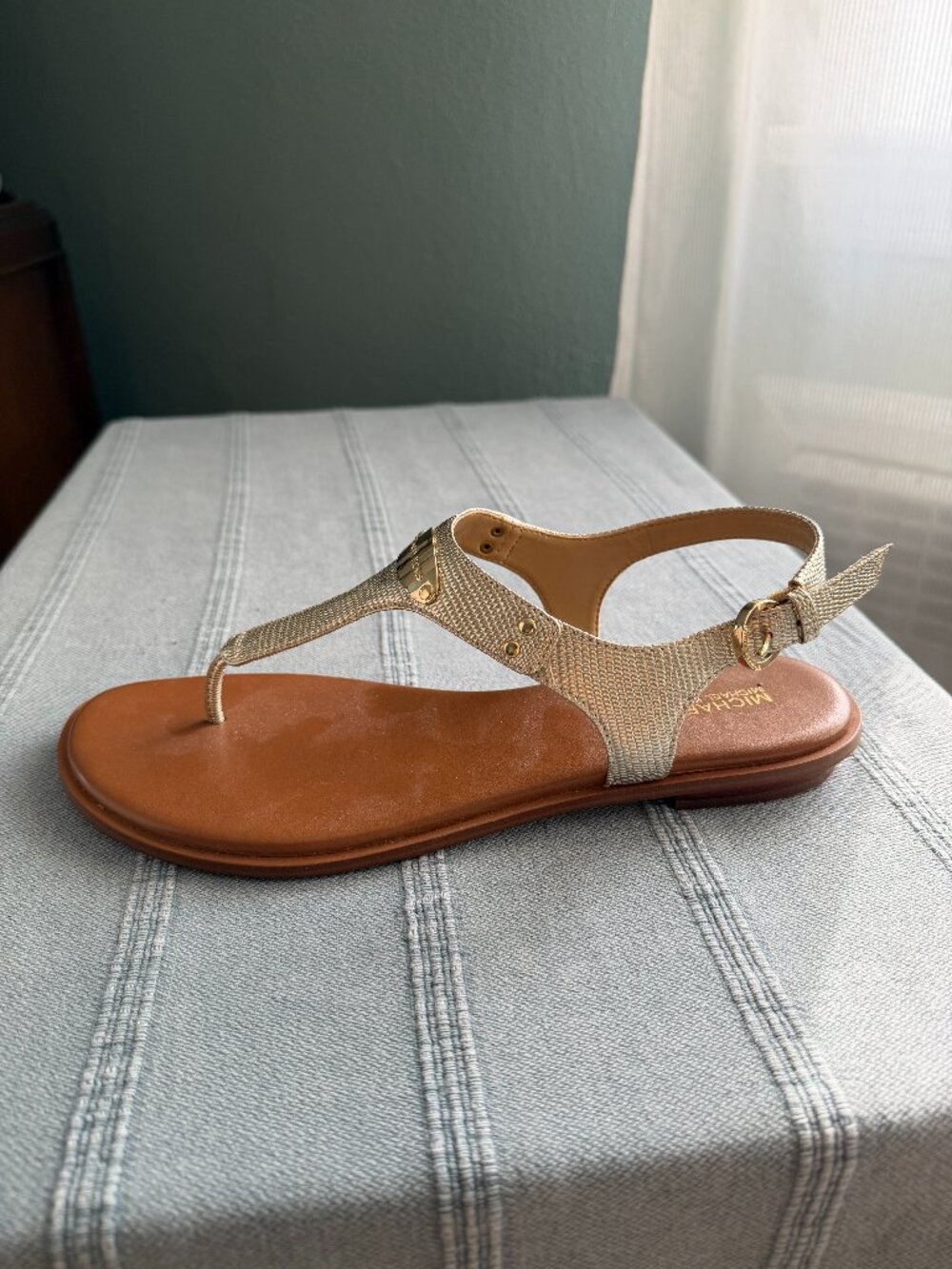 MICHAEL KORS ("snakeskin" look), gold buckled flat sandals